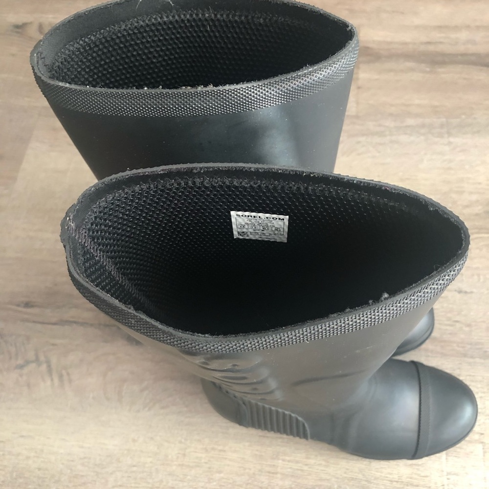 Sorel rain boots. Black wedge